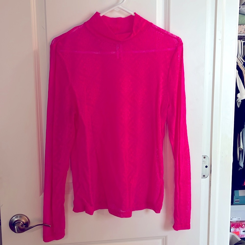 Neon pink lace turtleneck.